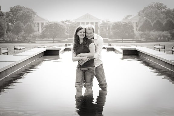 Couple wading in reflecting pool at UMD College Park