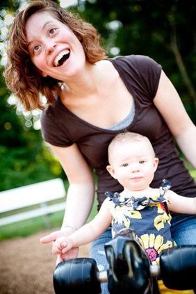 mother and baby on toy horse at allens pond in bowie md