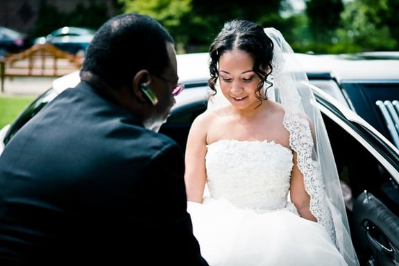 bride getting out of limo at the Newton White Mansion in Mitchellville MD