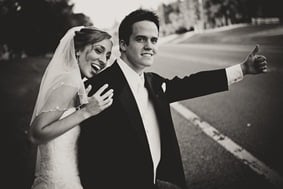 Bride and groom standing by road in mechanicsville md