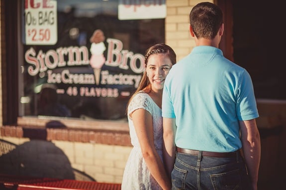 Engaged couple buying ice cream and coffee on a date