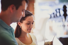 Engaged couple buying ice cream and coffee on a date