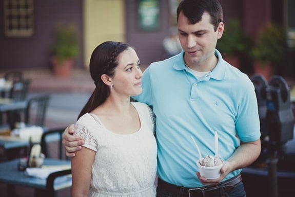 Engaged couple buying ice cream and coffee on a date