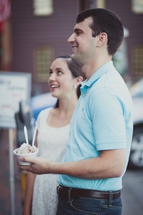 Engaged couple buying ice cream and coffee on a date