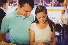 Engaged couple buying ice cream and coffee on a date