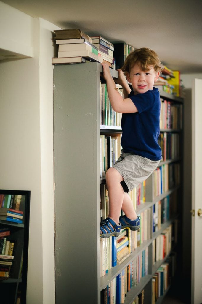 kidclimbingbookcase