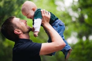 dad holding baby petruzzo photography