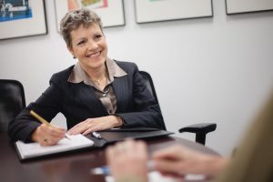 woman at desk in office petruzzo photography