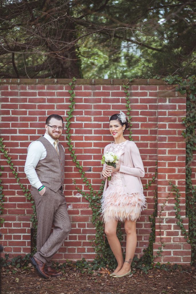 bride and groom posing for a photo