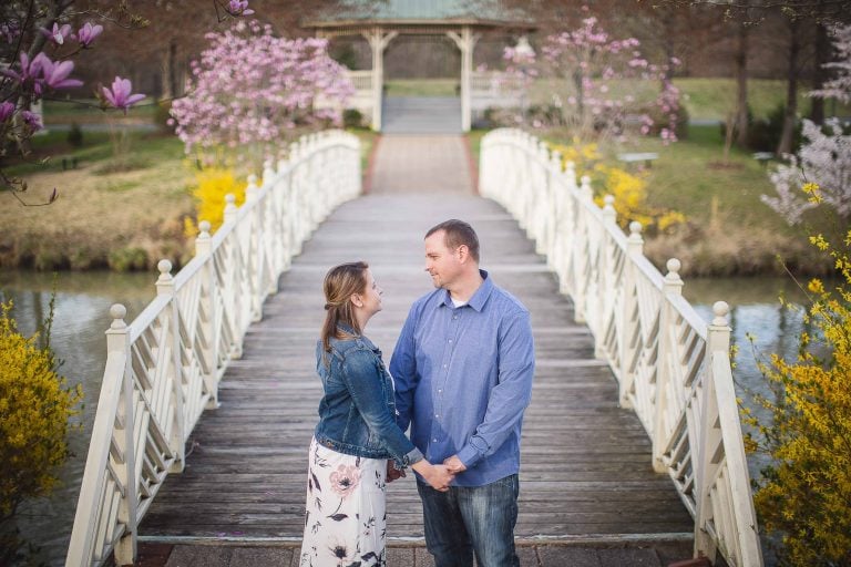 A couple standing on a bridge in Quiet Waters Park, Maryland.