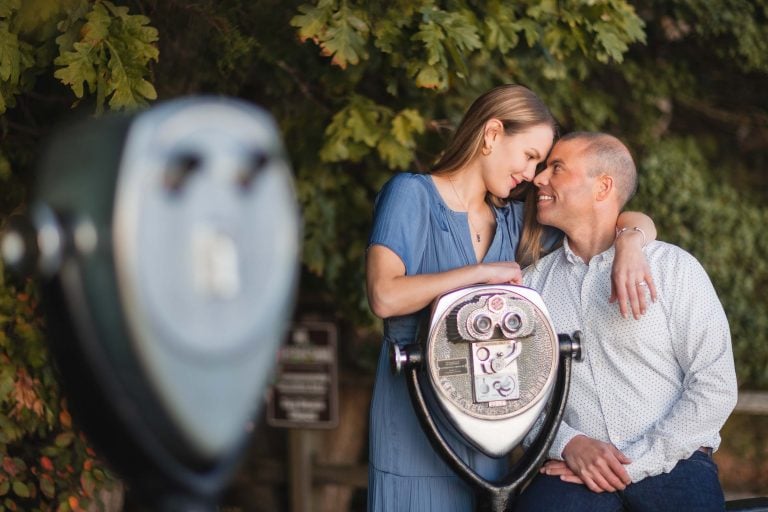 An engaged couple posing at Quiet Waters Park in Annapolis, Maryland.