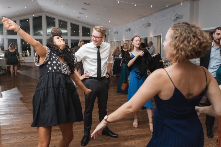 A group of people dancing at a wedding reception in Annapolis.