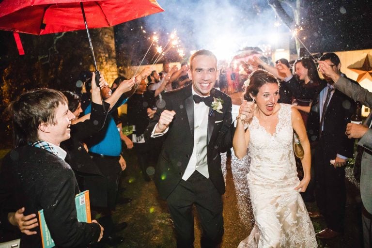 A bride and groom have a sparkler exit at Barns at Hamilton Station Vineyards in Hamilton, Virginia.