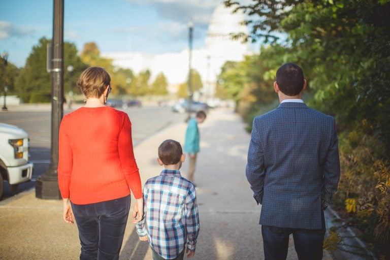 A family walking through Bartholdi Fountain & Gardens in Washington DC.