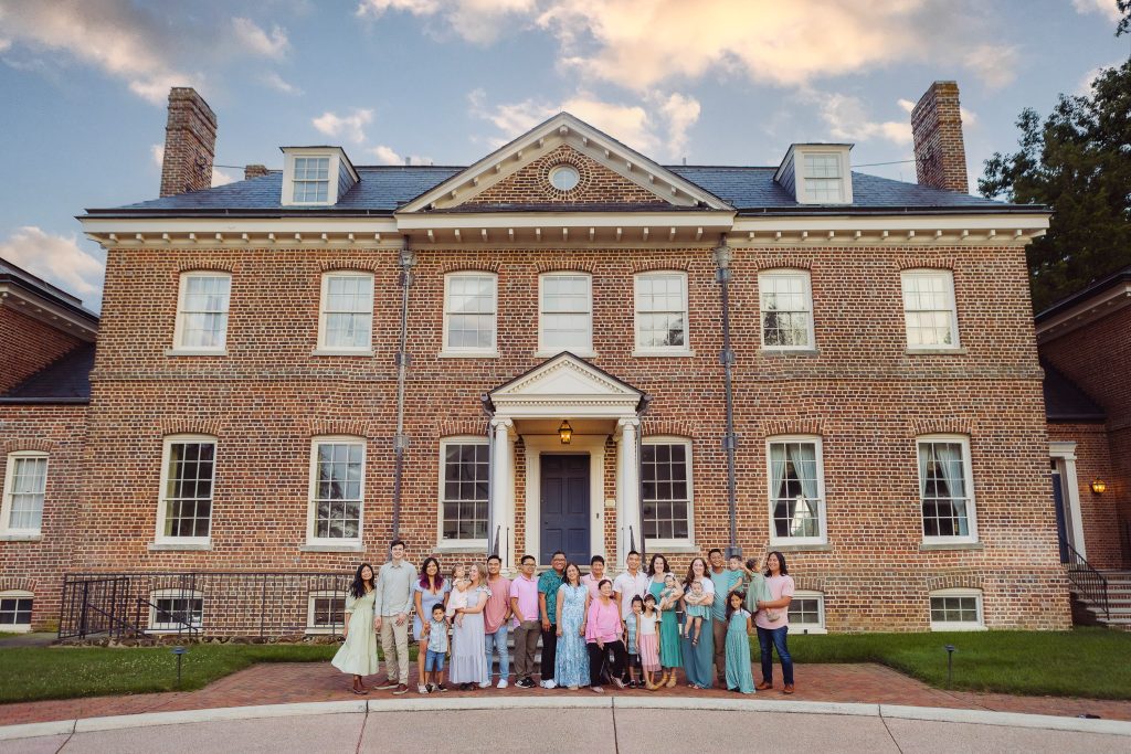 A group of bridesmaids posing in front of Belair Mansion in Maryland.