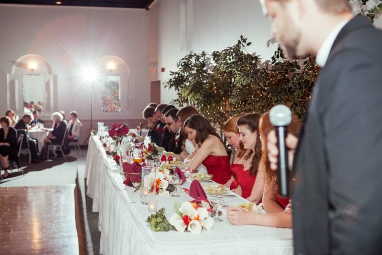 A group of people sitting at a table with a microphone in Bowie, Maryland.