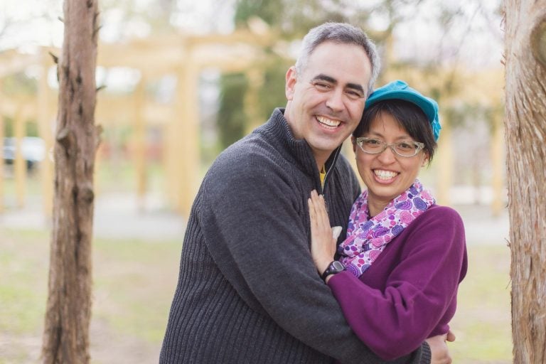 A man and woman hugging in General Getty Neighborhood Park.