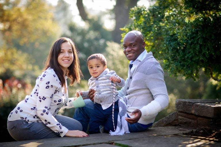 A black couple with a baby in a park near Glenview Mansion, Rockville, Maryland.