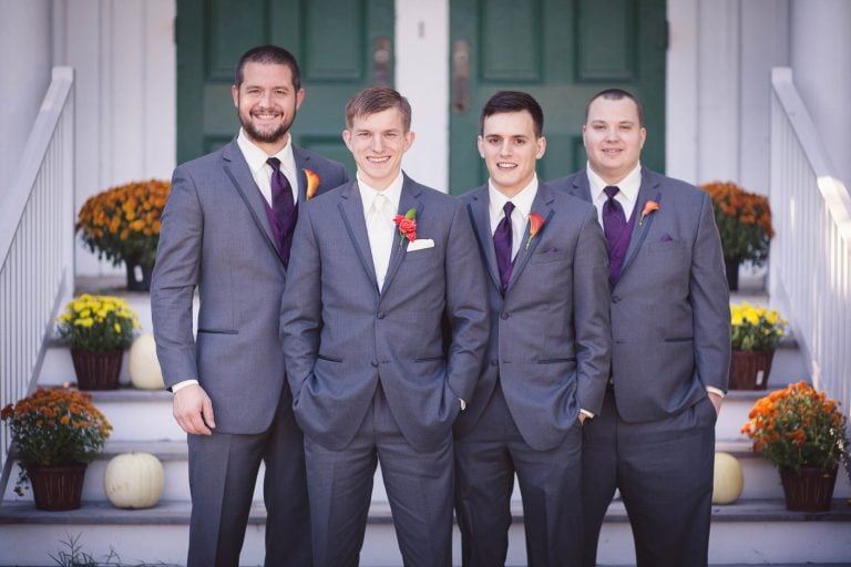 A group of groomsmen posing for a photo at Historic Baldwin Hall in Millersville, Maryland.