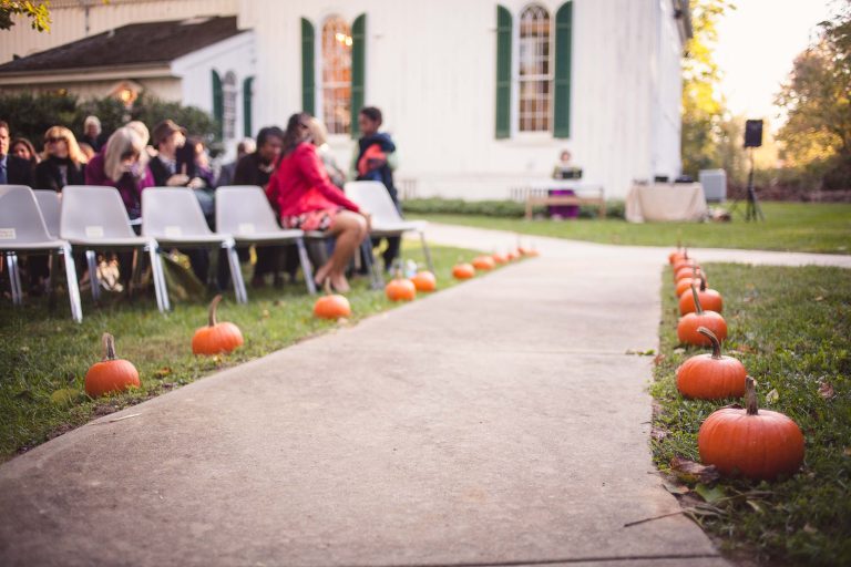 A walkway with pumpkins in the middle of Historic Baldwin Hall in Maryland's Millersville.