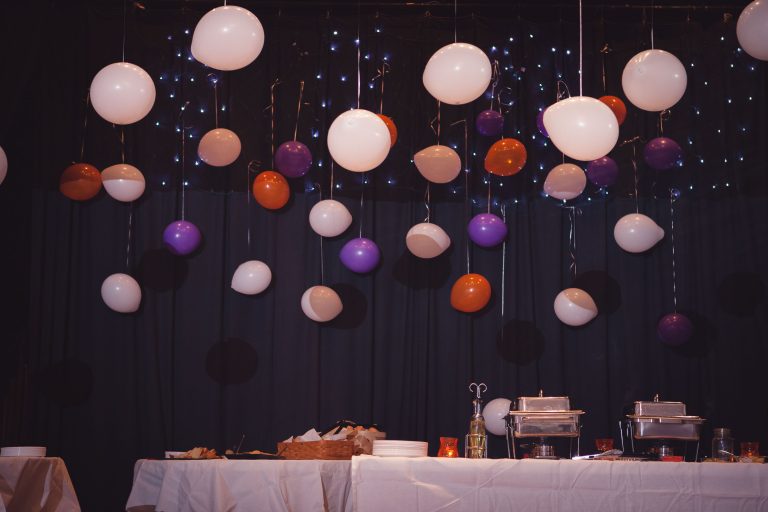 A historic room in Maryland's Baldwin Hall adorned with hanging balloons.