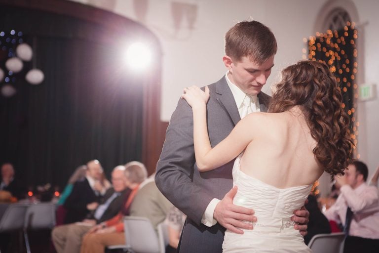 A bride and groom sharing their first dance at the Historic Baldwin Hall wedding reception in Millersville, Maryland.