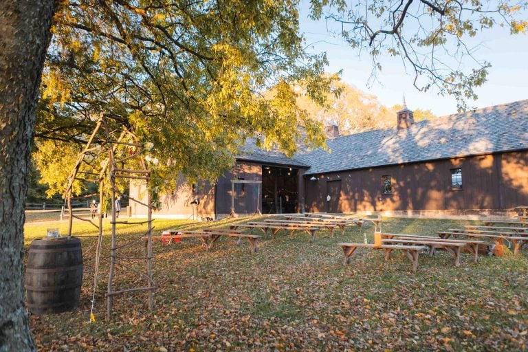 A barn with tables and chairs in Jefferson-Patterson Park, Maryland.