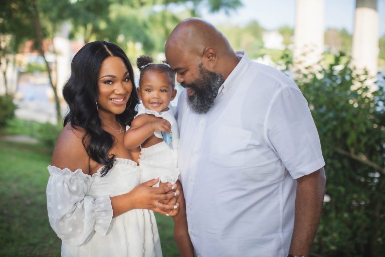 An African-American family poses for a photo in Jonas and Anne Catharine Green Park.