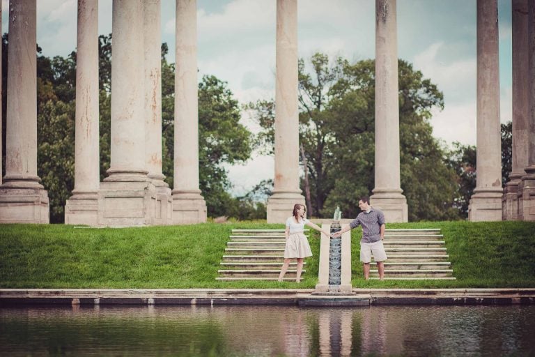 A couple standing in front of columns at the National Arboretum in Washington DC.