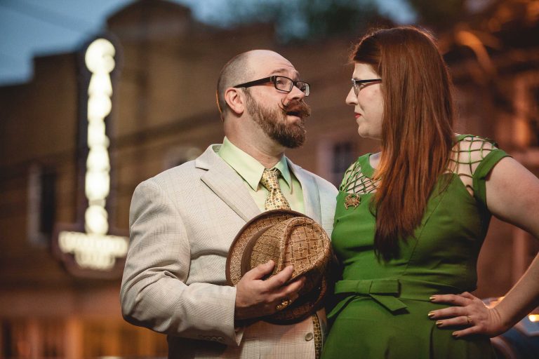 A man and woman are standing in front of a building in Ellicott City, Maryland.