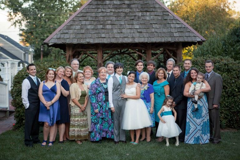 A group of people posing in front of the Vandiver Inn in Havre de Grace, Maryland.