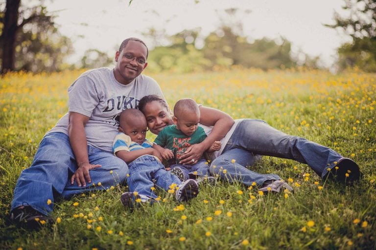 A family enjoys the grassy field at Wheaton Regional Park in Maryland.