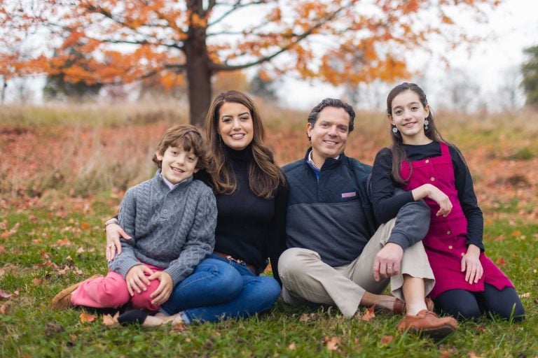 A family poses for a photo at Hampton Mansion in Towson, Maryland.