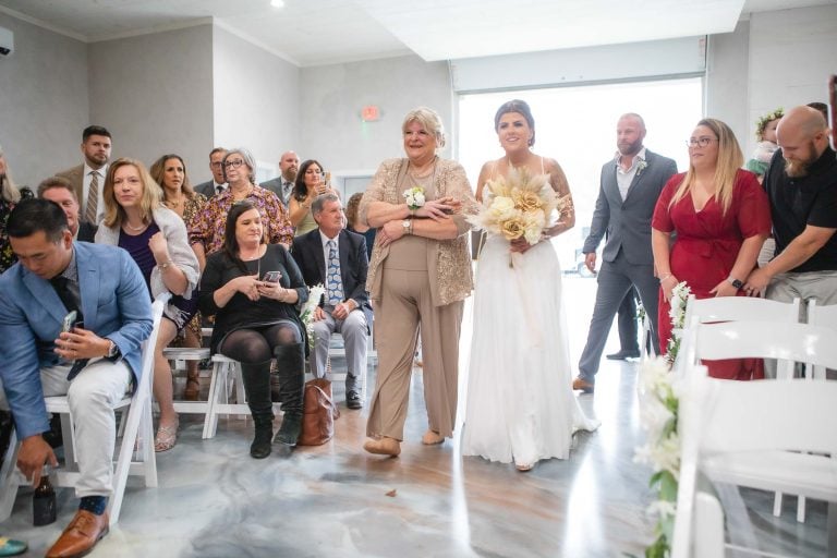 A bride walks down the aisle at a wedding ceremony in Upper Marlboro, Maryland.