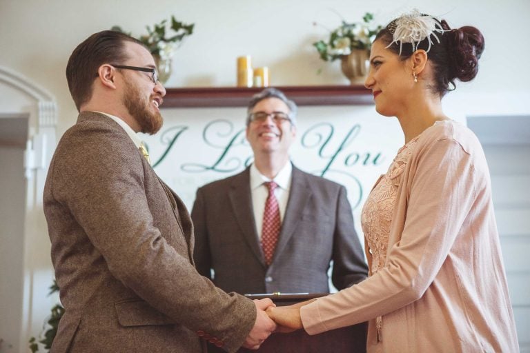 A man and woman exchange vows in a church in Annapolis, Maryland.