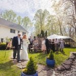 A couple's wedding ceremony at an outdoor venue.