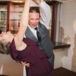 A couple dancing at a wedding reception.