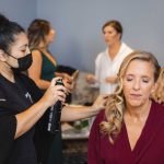 A candid bride preparing for her wedding.