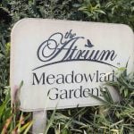 The detailed Artium Meadowland Gardens sign for weddings.