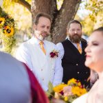 A couple gazes at each other during their wedding ceremony.