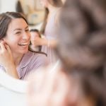 Candid bride preparation.