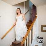 A candid bride preparing for her wedding.