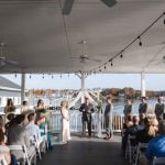 A waterfront wedding ceremony.