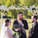 A couple exchanging vows at their wedding ceremony.