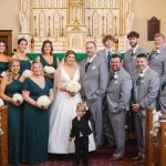 A wedding party portrait in a church.