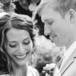 A black and white photo of a wedding ceremony.