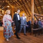 A wedding ceremony in a barn.