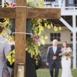 A wooden cross at a wedding ceremony.