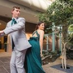 A bride and groom dancing at their wedding reception.