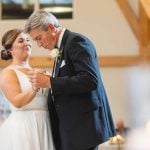 A couple's first dance at their wedding reception.